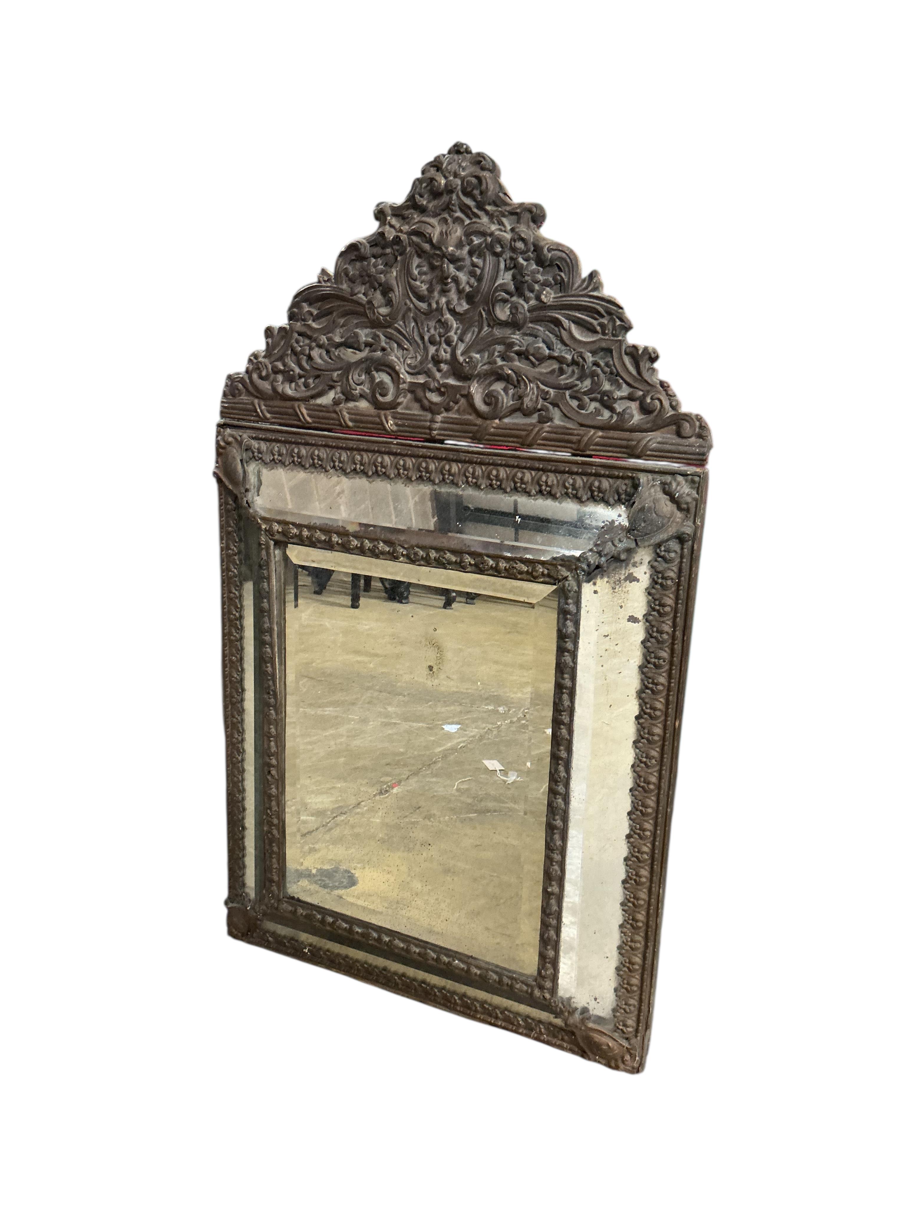 A 19th century French embossed brass wall mirror, width 59cm, height 102cm